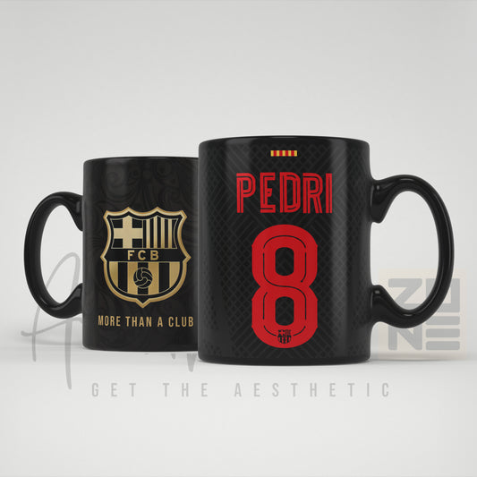 Two black mugs with FC Barcelona logo and text on a white background