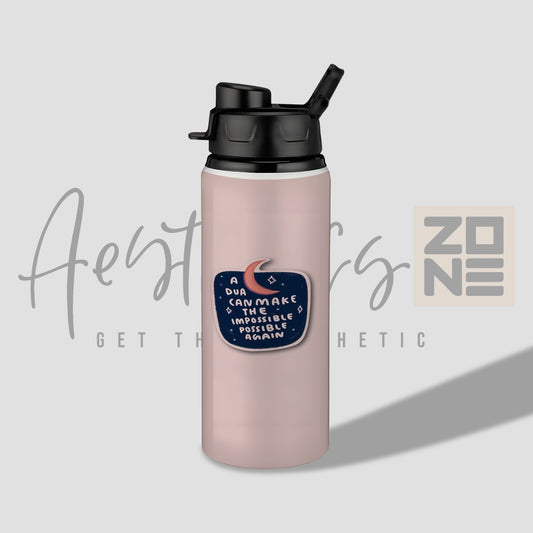 Pink water bottle with a motivational sticker on a light gray background