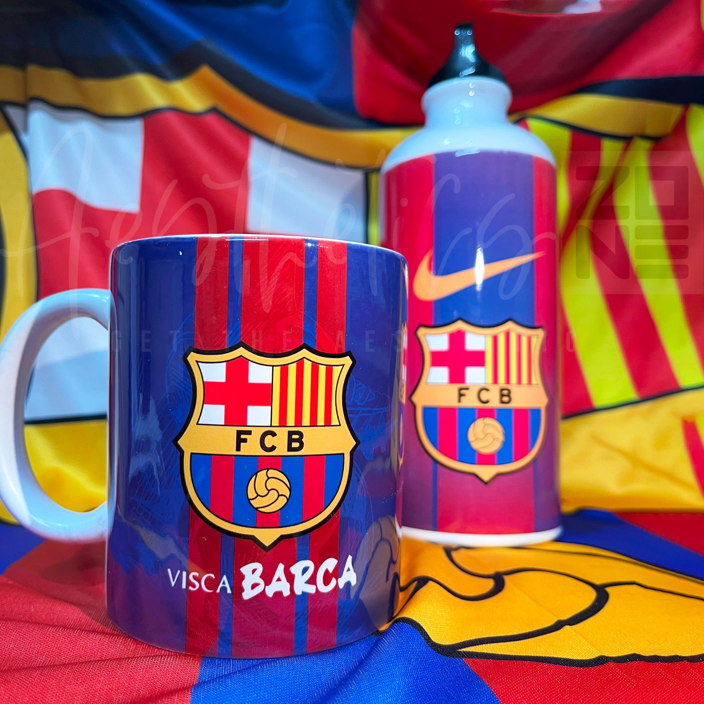 Mug and water bottle with FC Barcelona logo on a colorful background