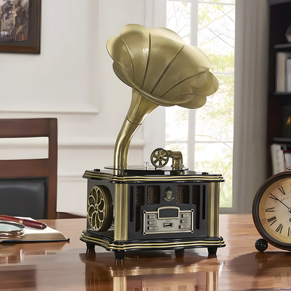 Vintage-style gramophone on a wooden table with a clock and chair in the background.