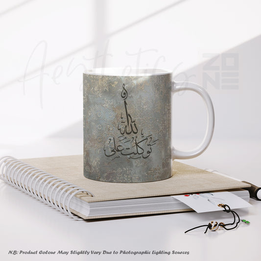 Mug with Arabic calligraphy on a notebook with a white background
