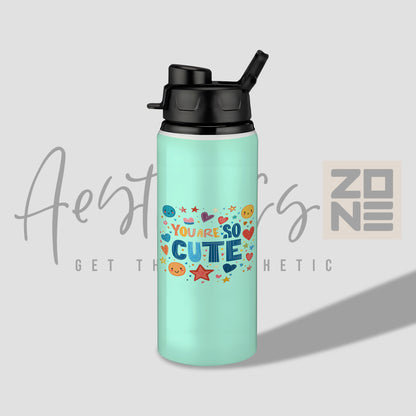 Mint green water bottle with colorful text and graphics on a light gray background