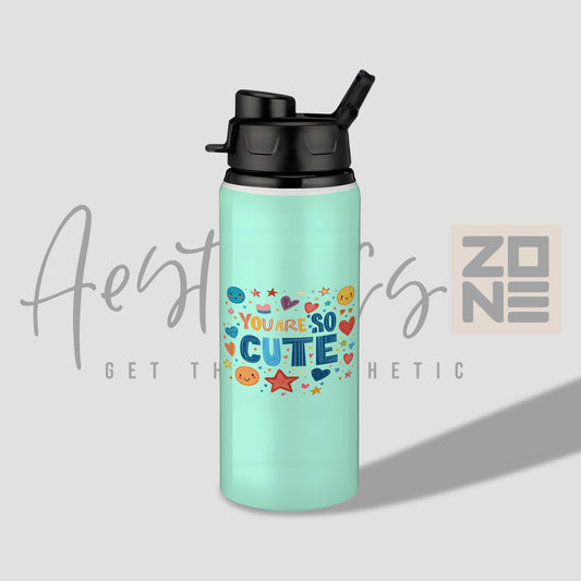Mint green water bottle with colorful text and graphics on a light gray background