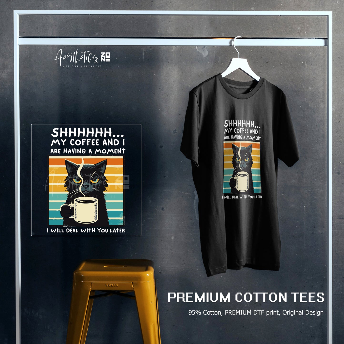Black t-shirt with a graphic design of a cat and coffee cup, displayed on a hanger against a dark background.