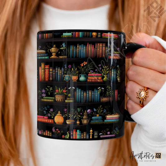 Person holding a mug with a colorful bookshelf design