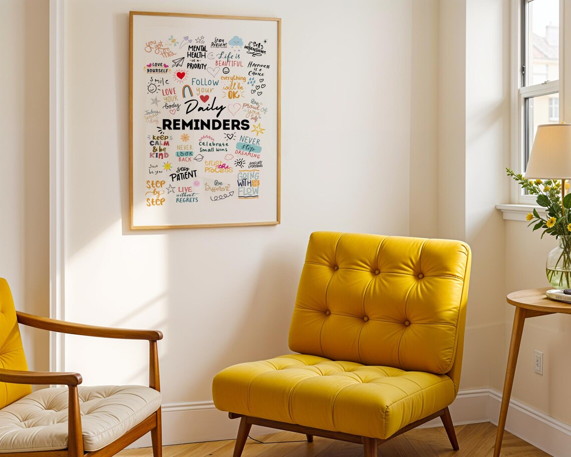 Yellow armchair in a room with a framed poster on the wall